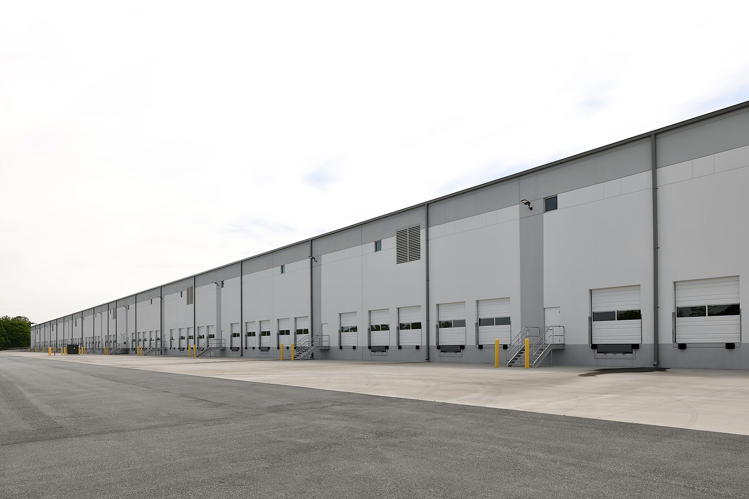 Exterior view of commercial warehouse with loading docks