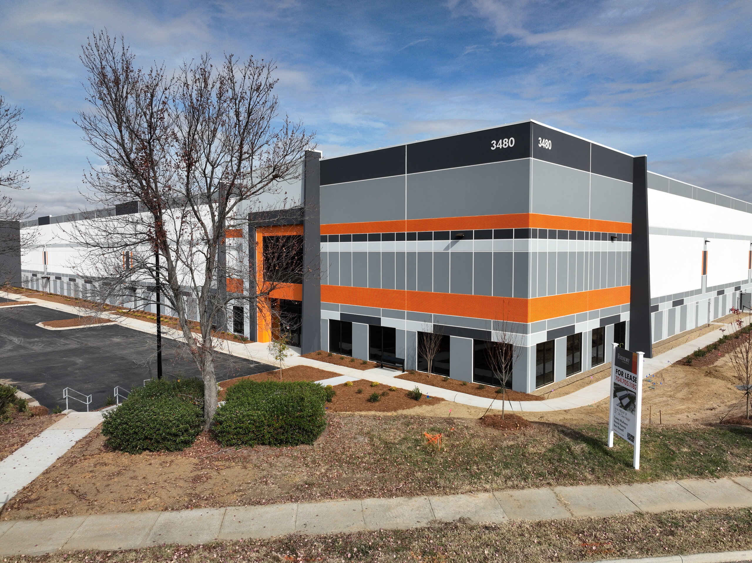 Building exterior showcasing architecture and landscaping