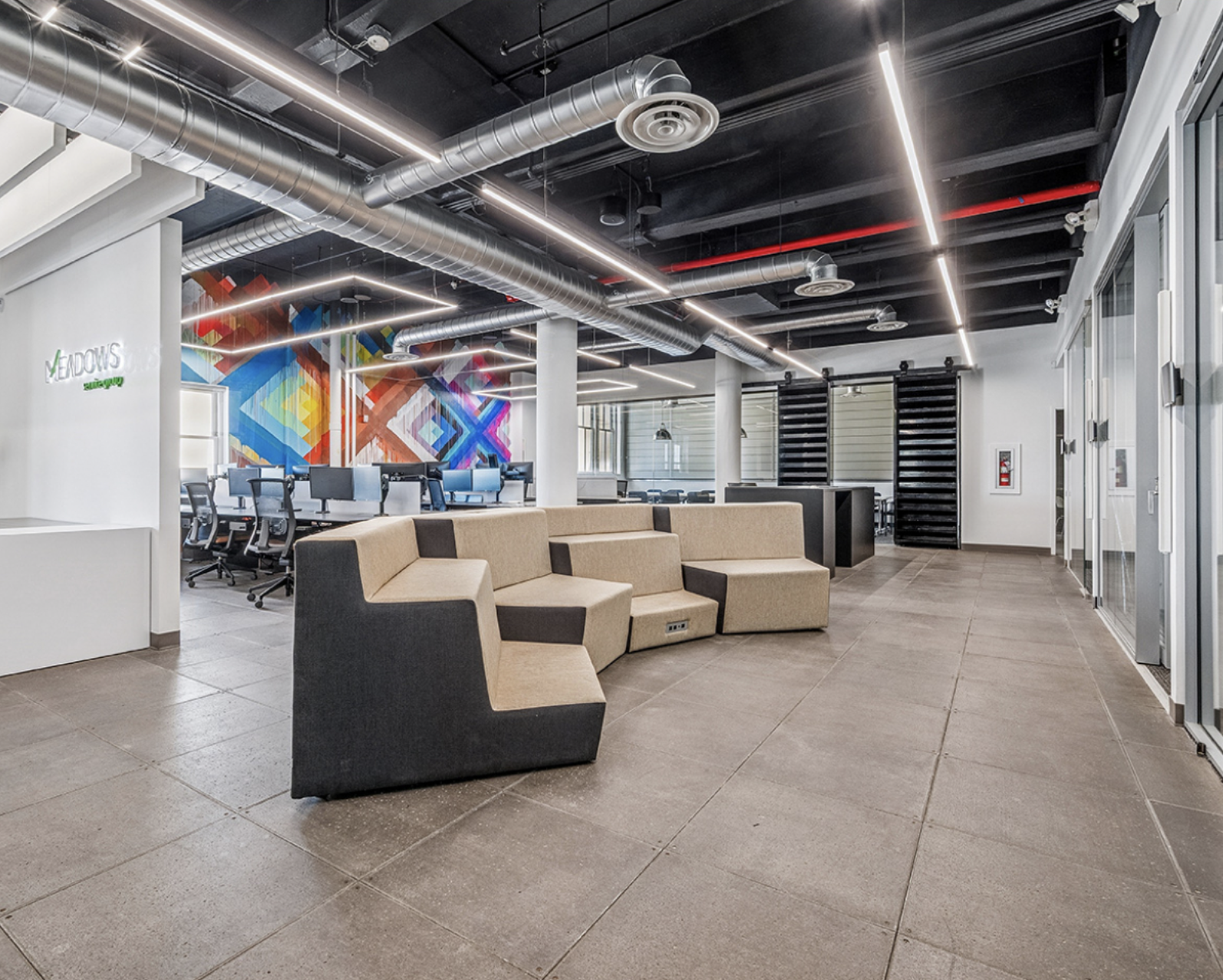 Sunlit loft-style interior at 625 West 55th Street