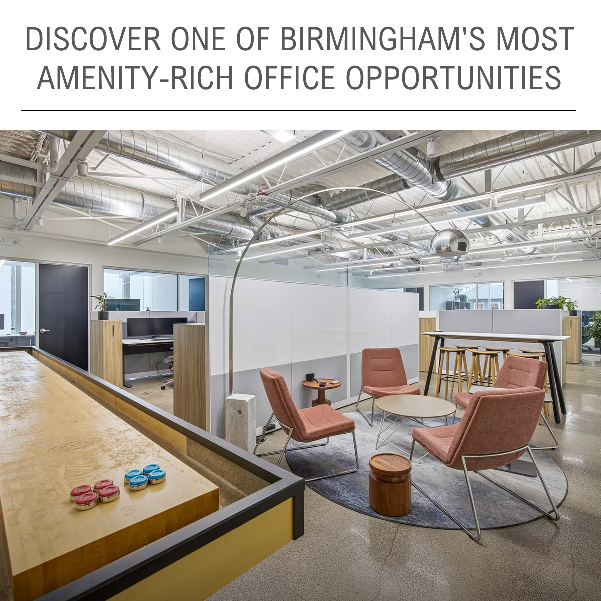 Modern office space featuring seating areas and collaborative workspaces