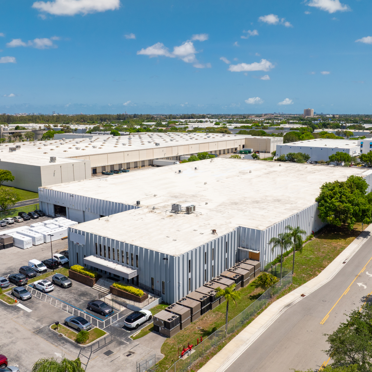 Front exterior view with parking and landscaping