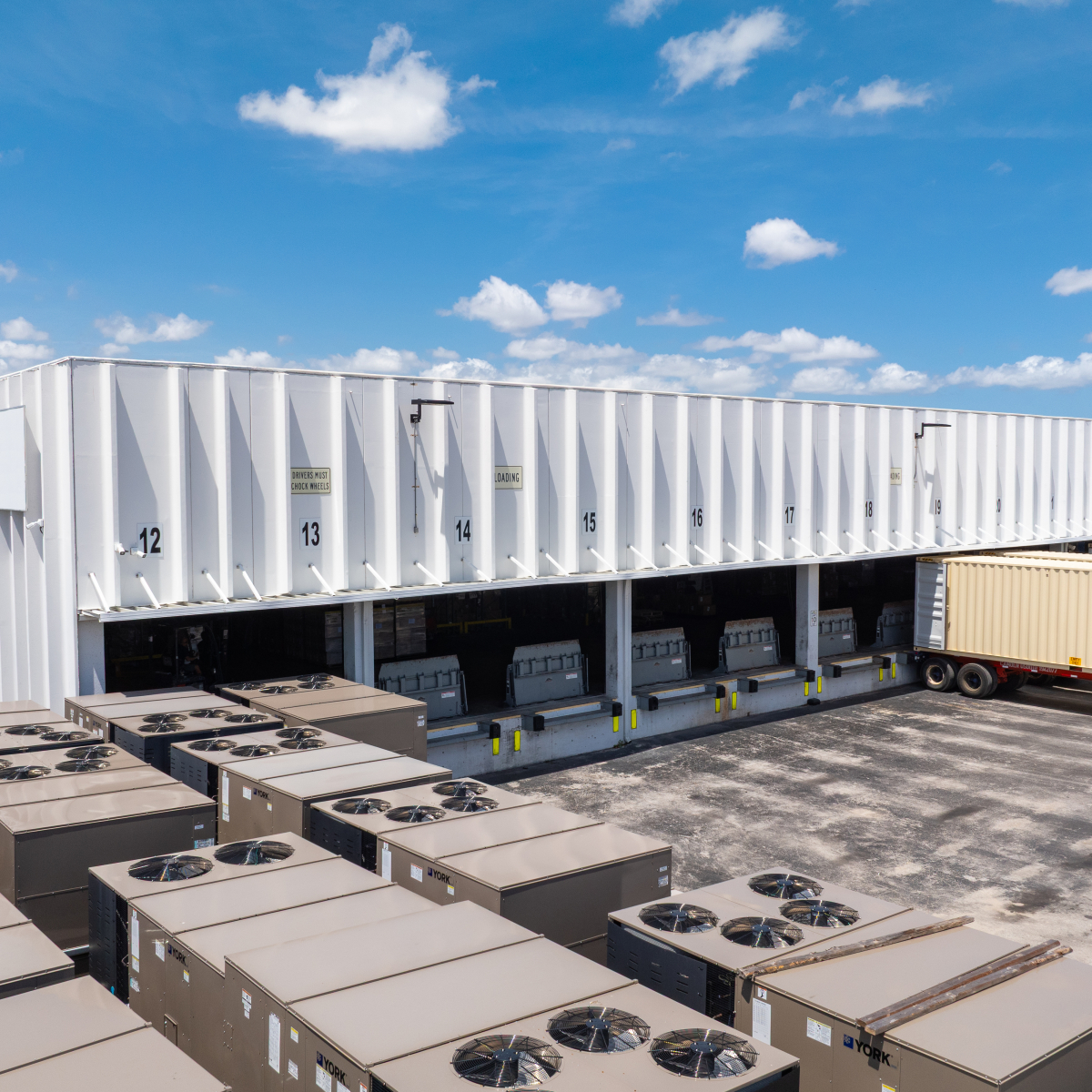 Aerial view showing loading docks and rooftop equipment