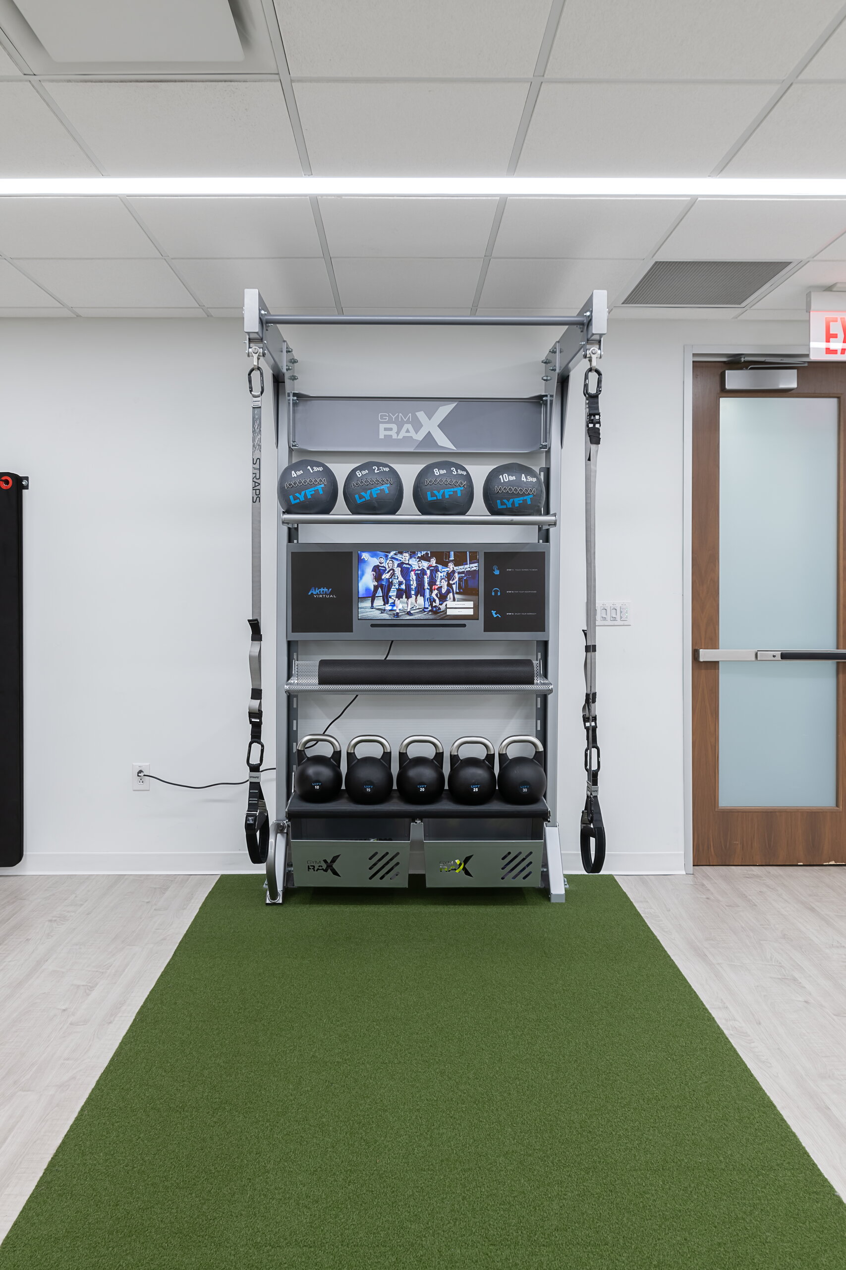 Fitness center interior at 823 Congress Ave