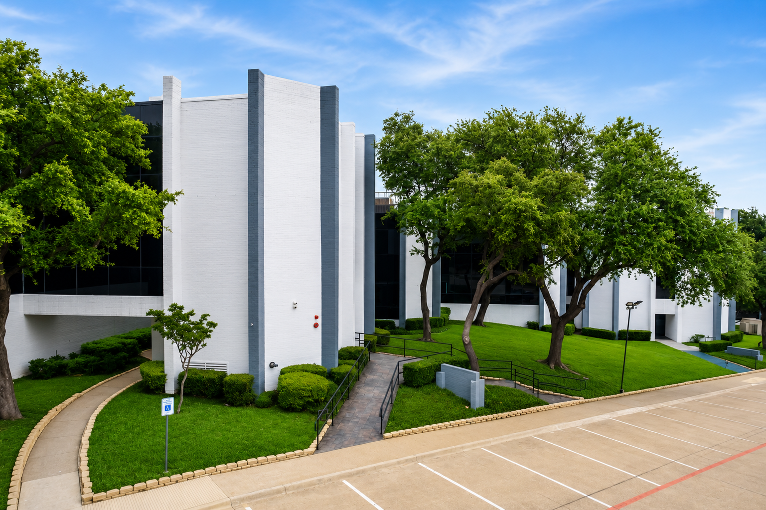 Modern architectural exterior and parking at office park