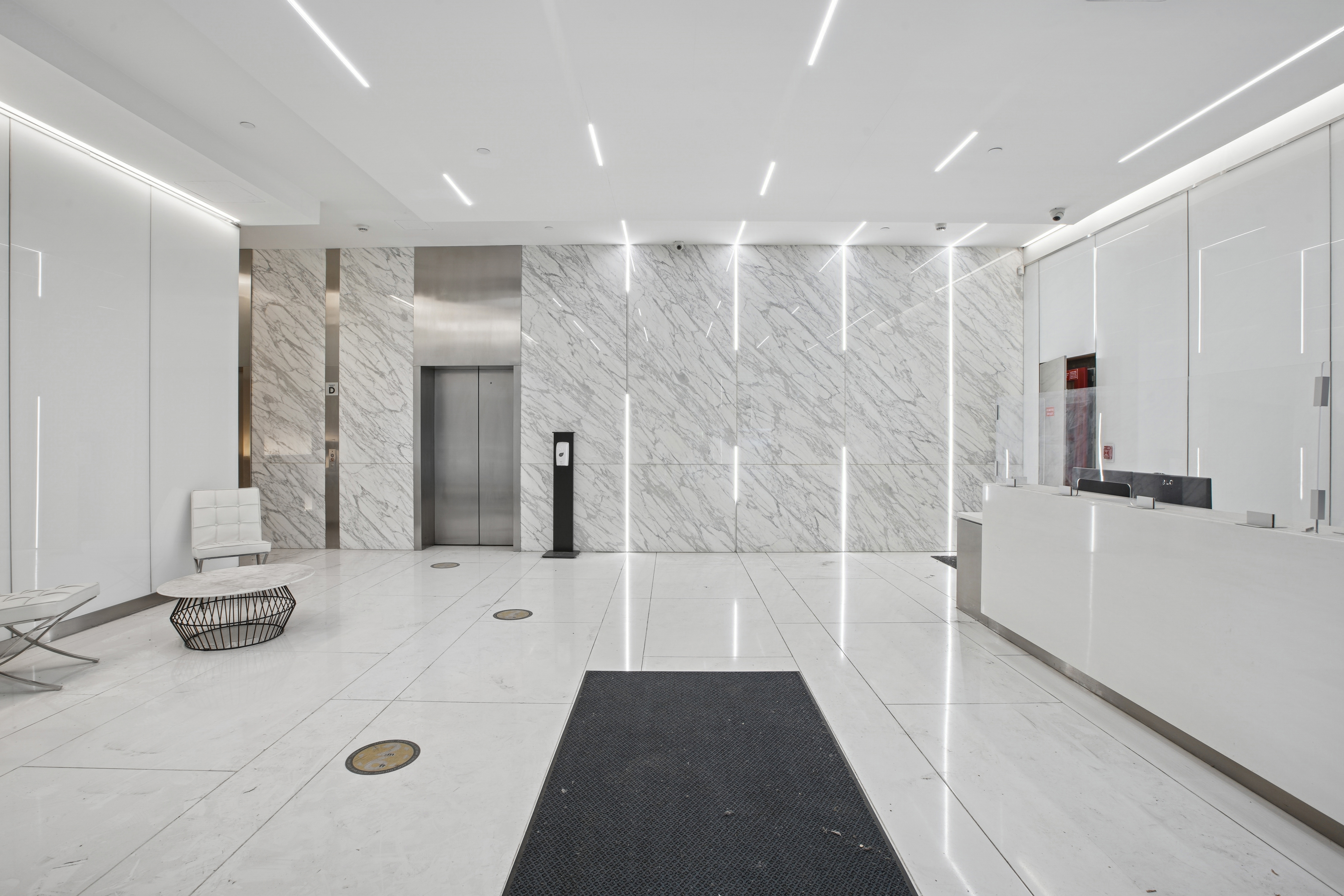Light-filled marble lobby at 133 West 52nd Street