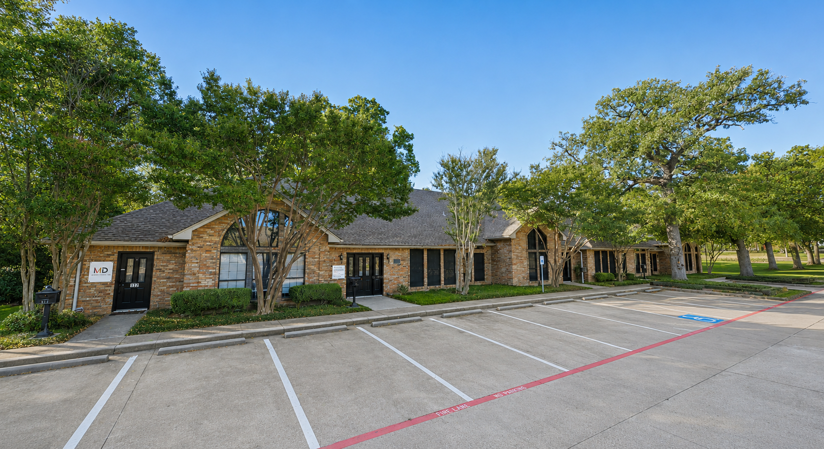 Landscaped frontage and surface parking at Park Central