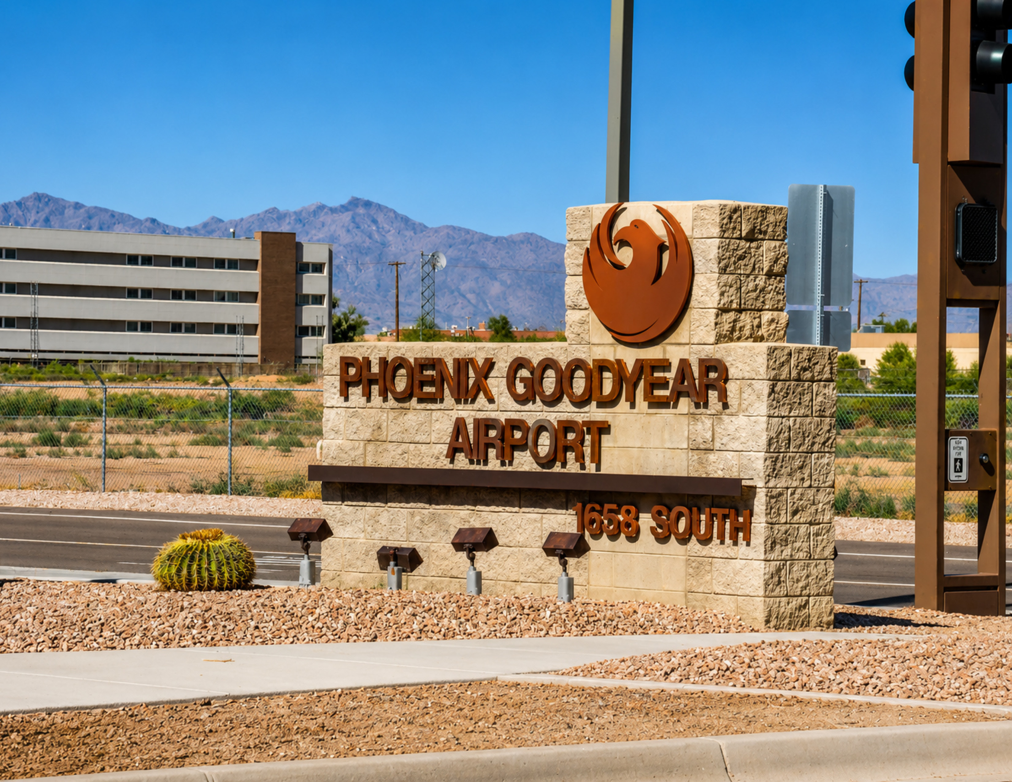 Building exterior with signage and landscaping