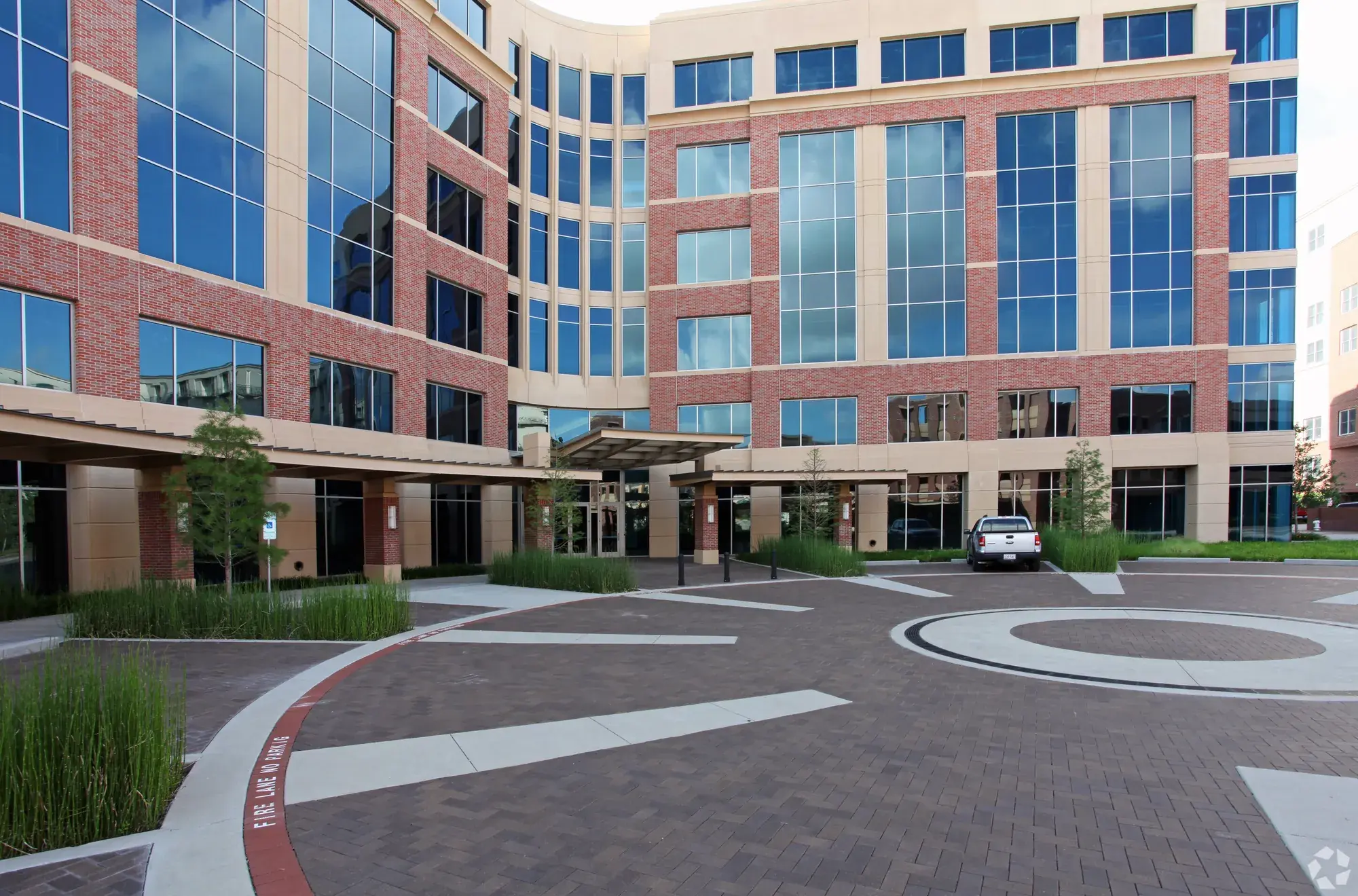 The landscaped arrival drive and entrance at Two Addison Circle