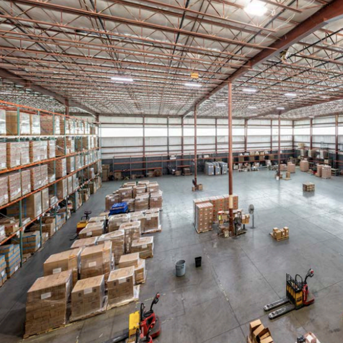 Warehouse interior with pallet racking and open floor space