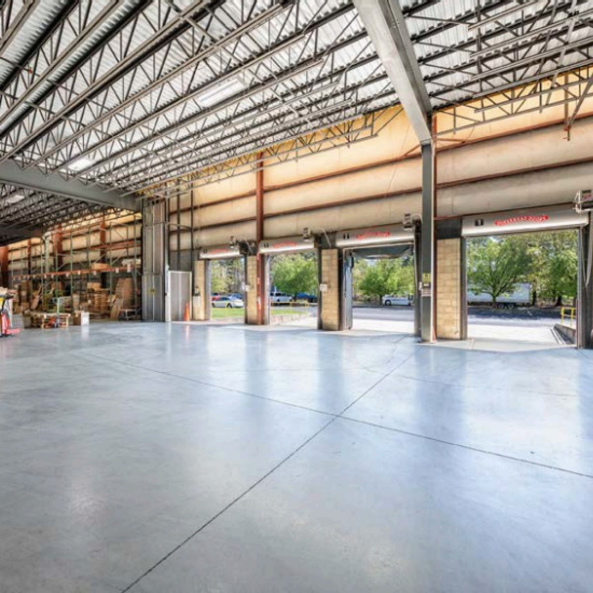 Open warehouse interior with drive-in doors